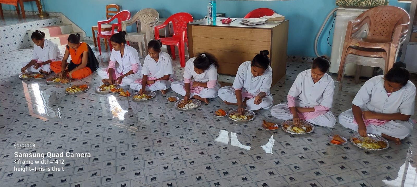 Volunteers distributing meals to families in need