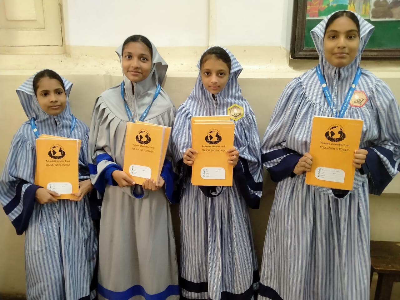 Volunteers and school children at a community outreach event